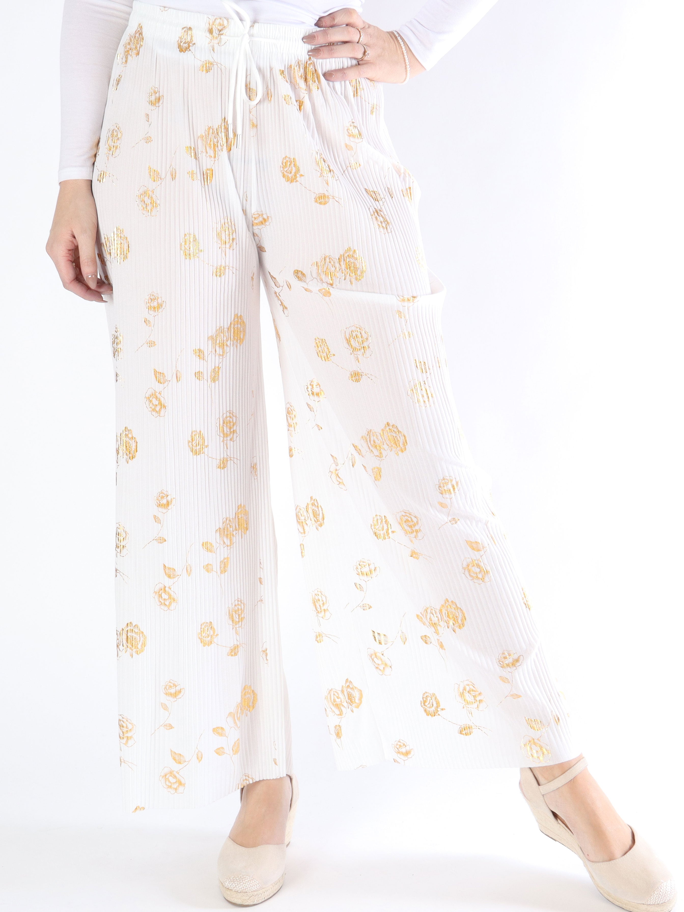 Alpha - Plisserade byxor med guldblommor